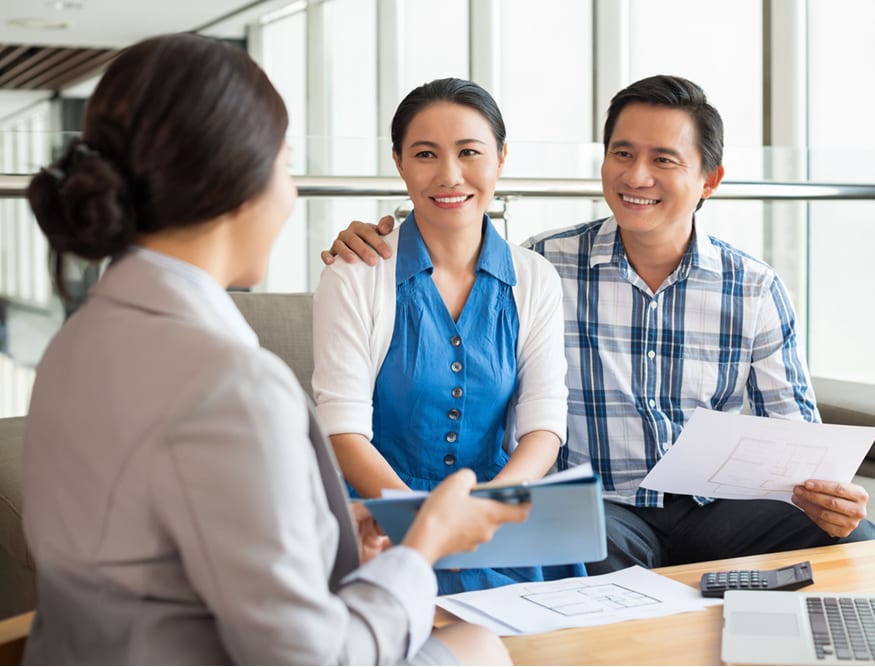 Asian couple meeting with financial advisor